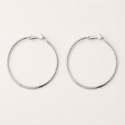 A Twist of Love Textured Hoop Earrings — Silver